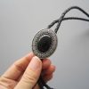 Black Stone-Like Oval Bolo Tie
